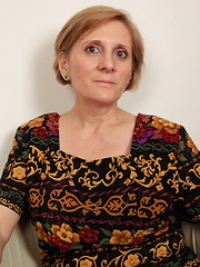 Older lady using red toy for her hungry holes